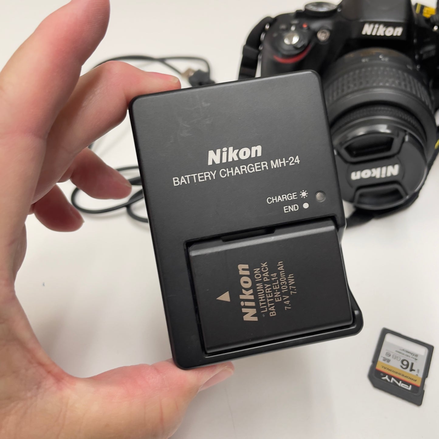 Nikon D5100 DSLR Camera Bundle – with 18-55mm VR Lens, 50mm f/1.8G Prime Lens, Bag, Charger & SD Card