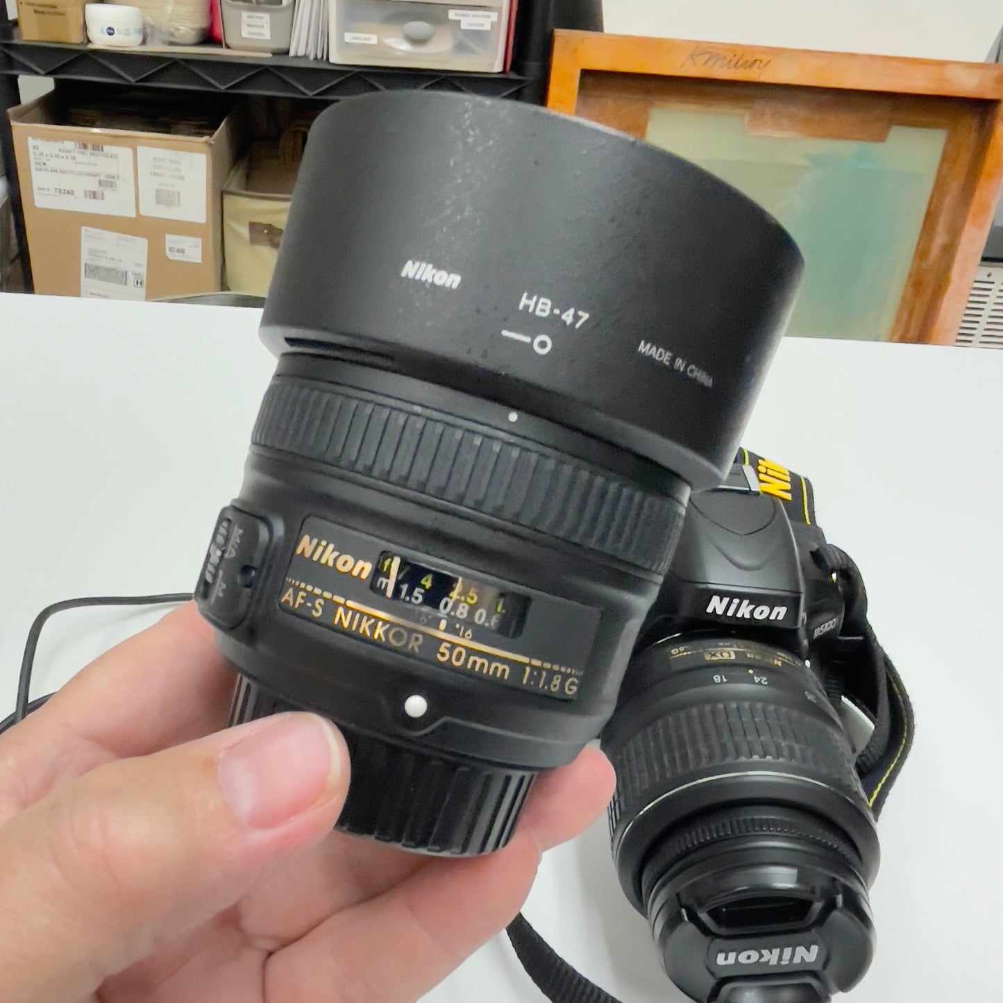 Nikon D5100 DSLR Camera Bundle – with 18-55mm VR Lens, 50mm f/1.8G Prime Lens, Bag, Charger & SD Card