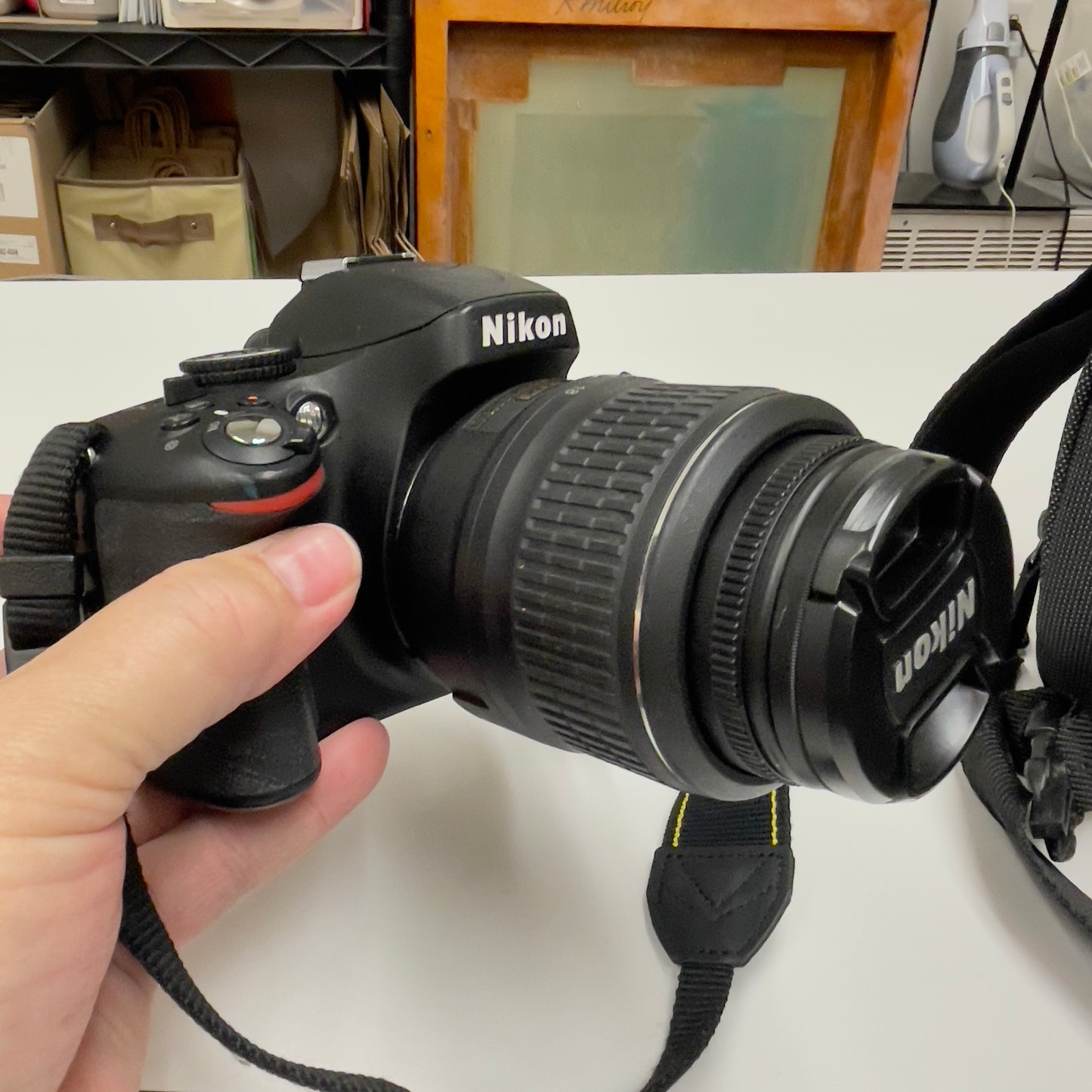 Nikon D5100 DSLR Camera Bundle – with 18-55mm VR Lens, 50mm f/1.8G Prime Lens, Bag, Charger & SD Card