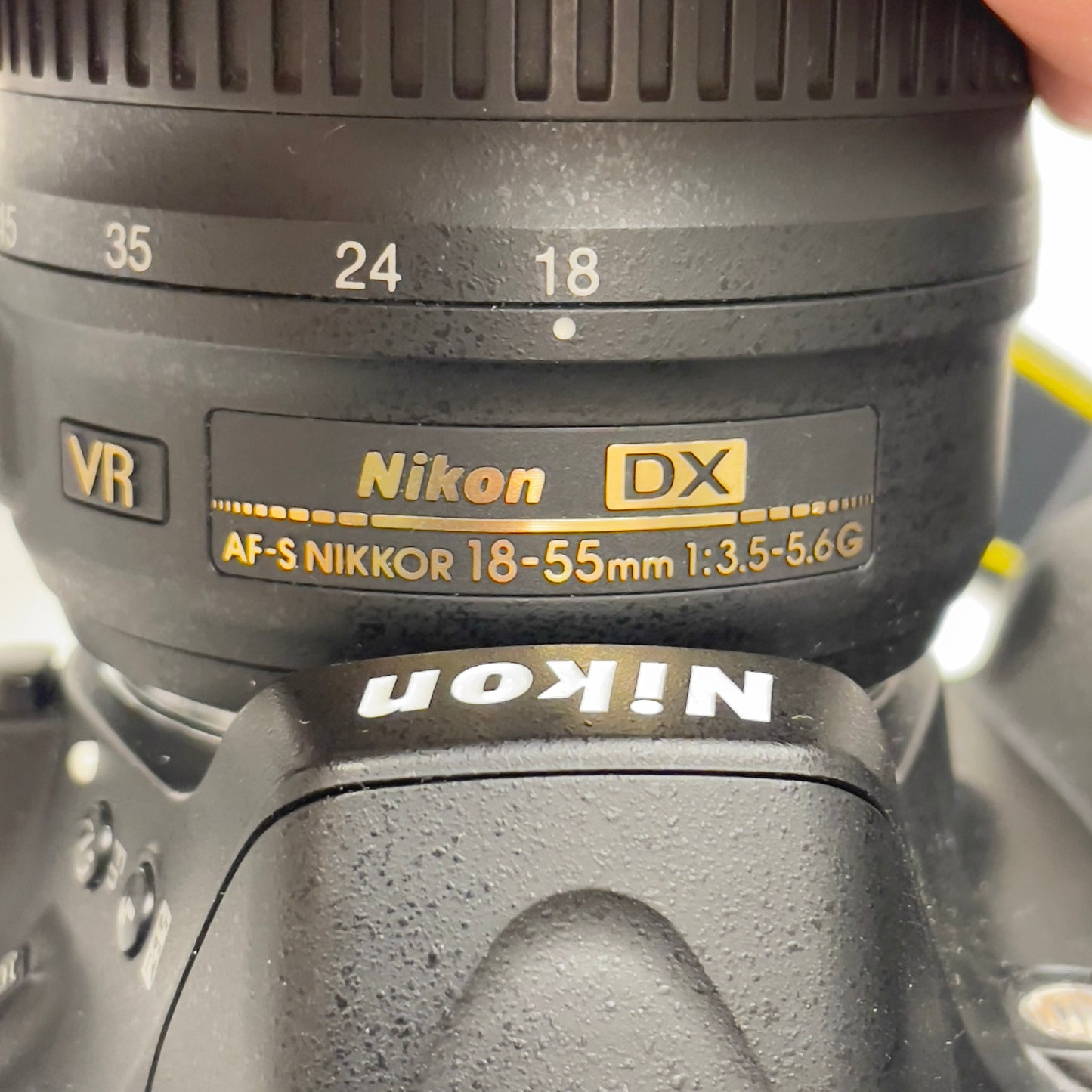 Nikon D5100 DSLR Camera Bundle – with 18-55mm VR Lens, 50mm f/1.8G Prime Lens, Bag, Charger & SD Card