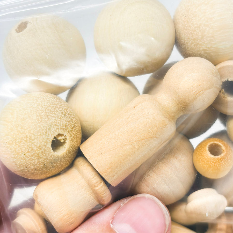 Bundle of Wood Caps, Beads, and Peg Dolls