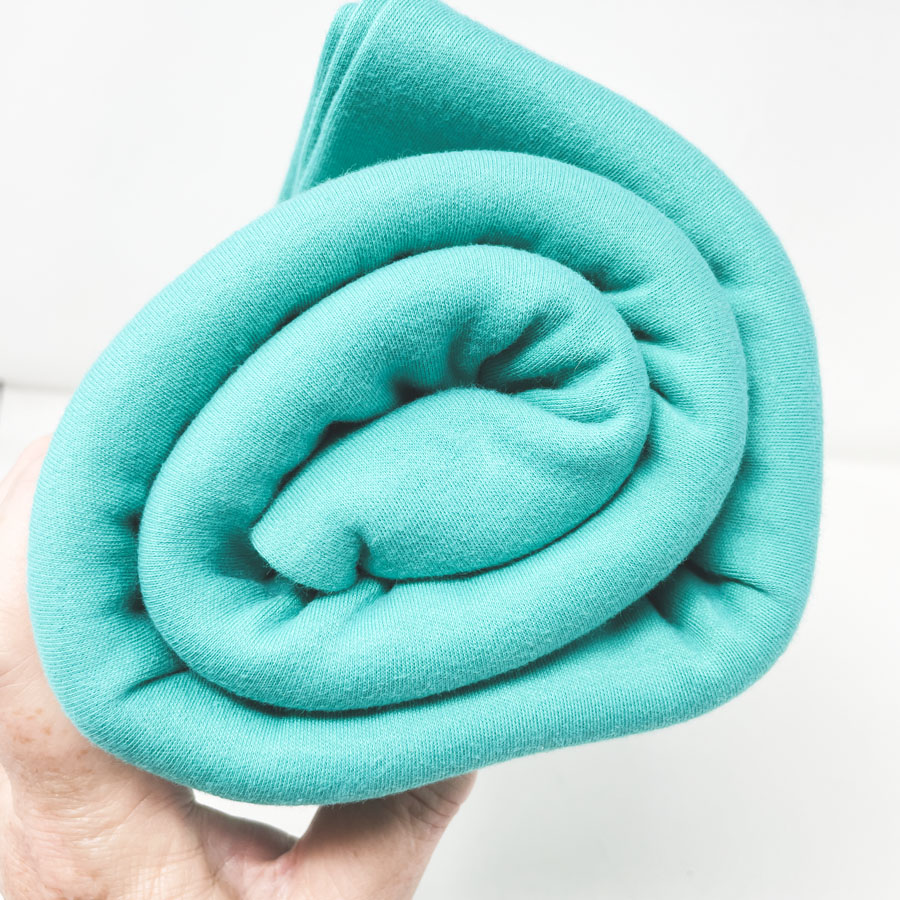 28" Diameter x 108" L Tubular of Aqua Stretch Jersey Fabric
