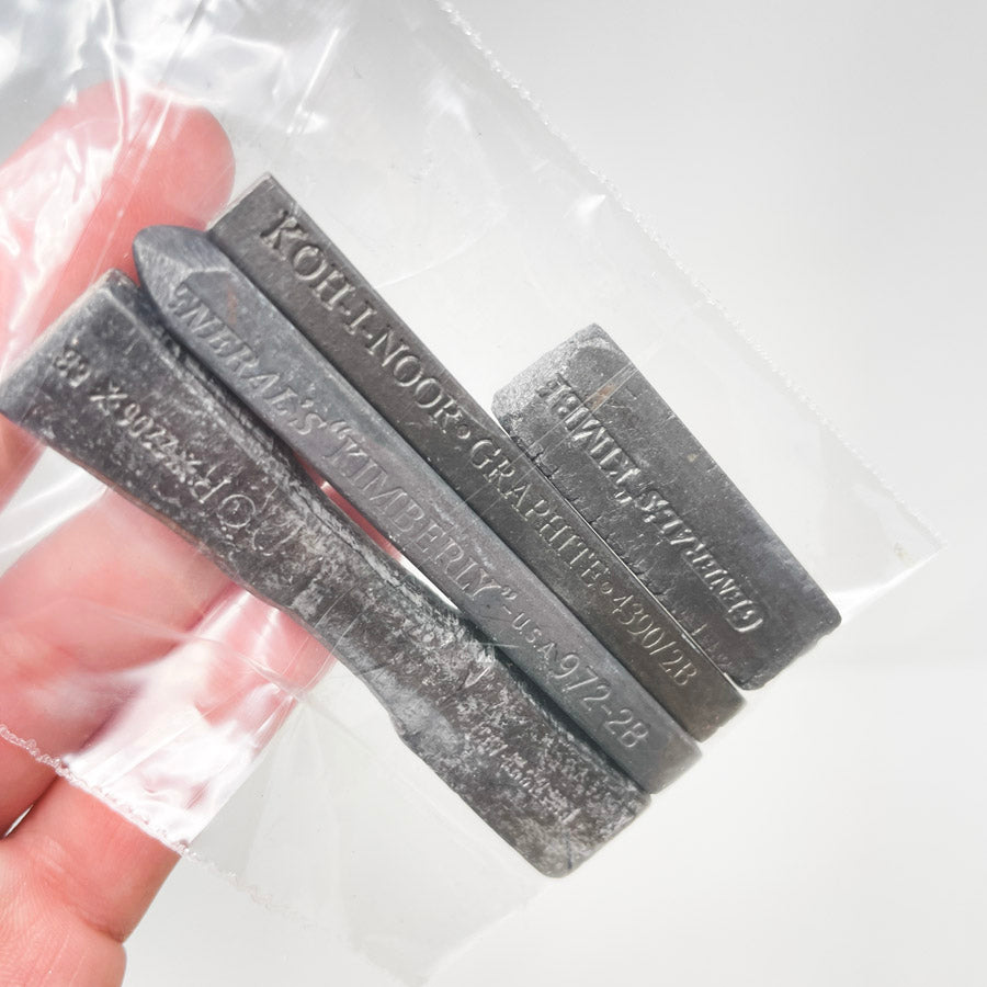 Bundle of Four Graphite Blocks