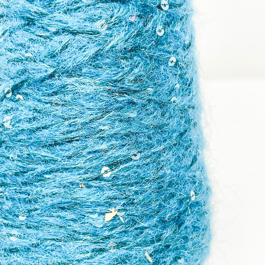 Cone of Turquoise Yarn with Sequins
