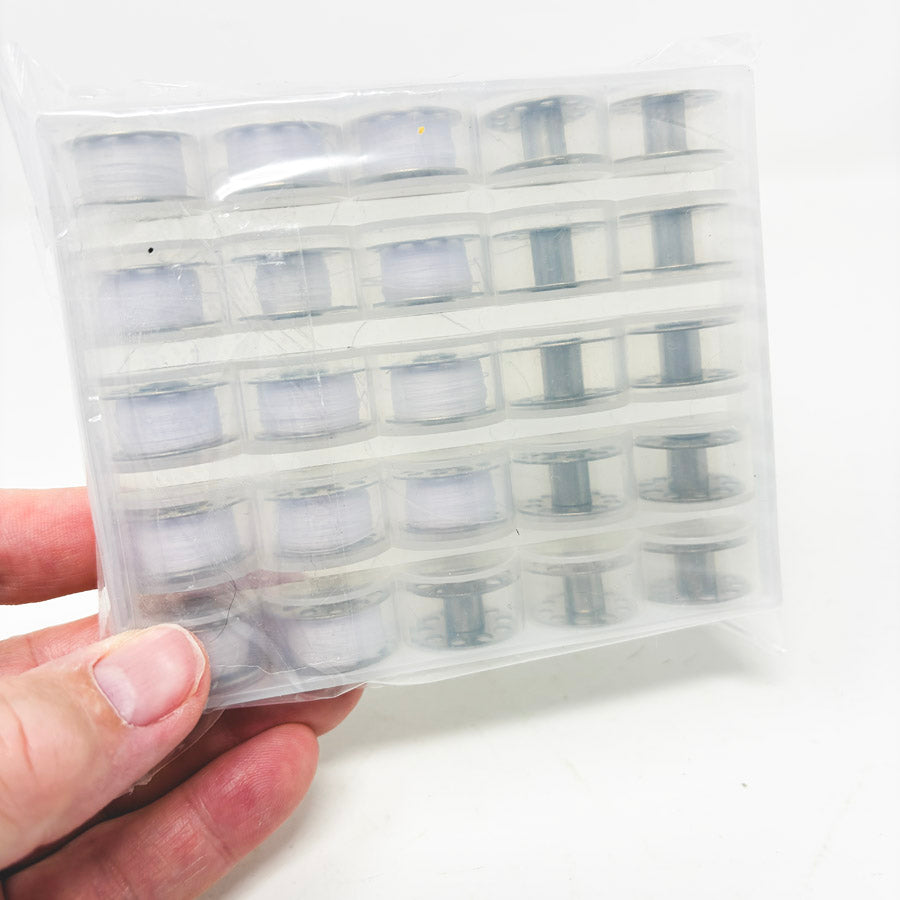 25 Metal Bobbins in Tray