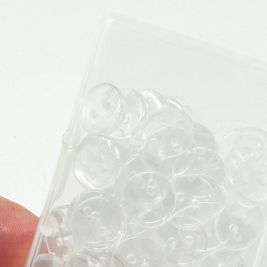 Box of Clear Plastic Buttons