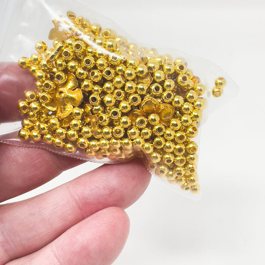 Assorted Gold Plastic Beads