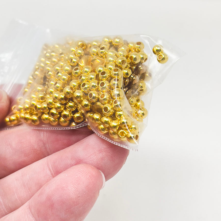 Assorted Gold Plastic Beads