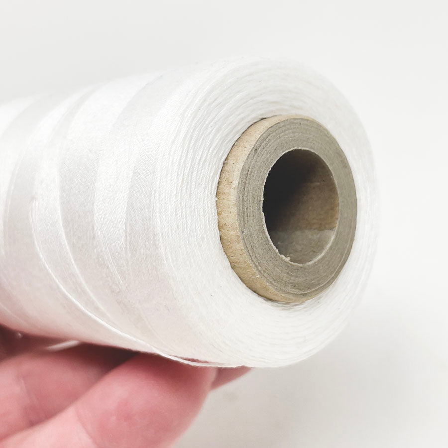 White Thread with Wooden Spool
