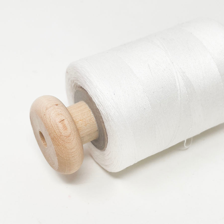 White Thread with Wooden Spool