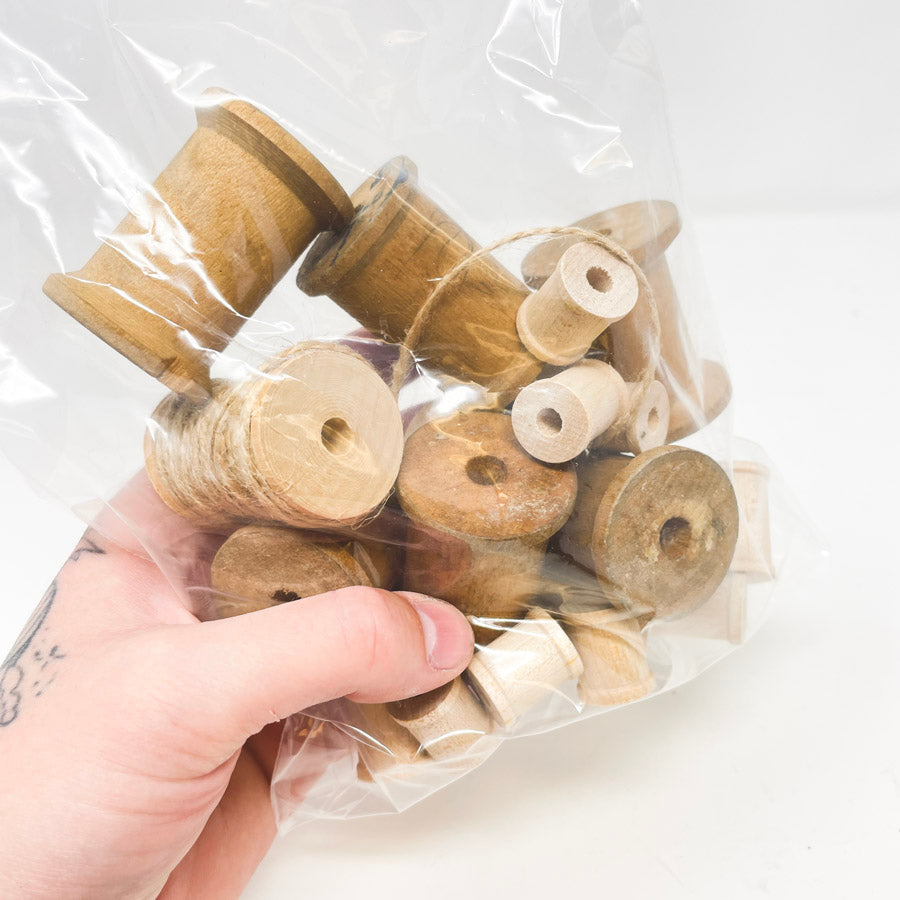 Bundle of Wood Thread Spools