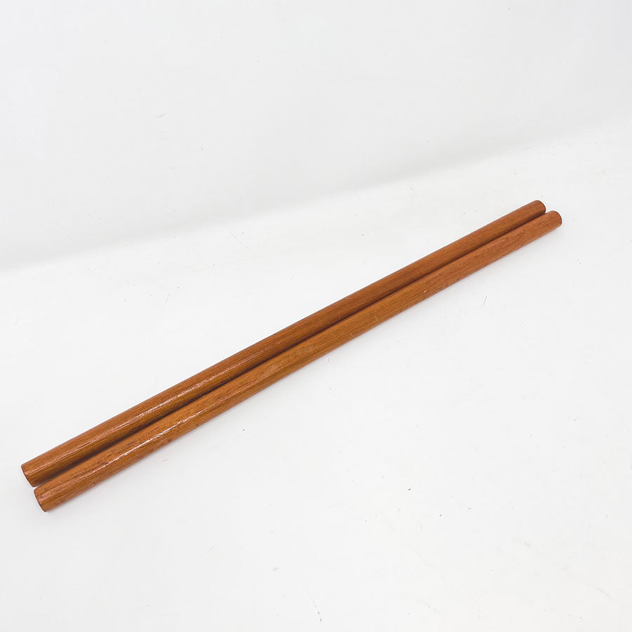Two Finished Wood Dowels