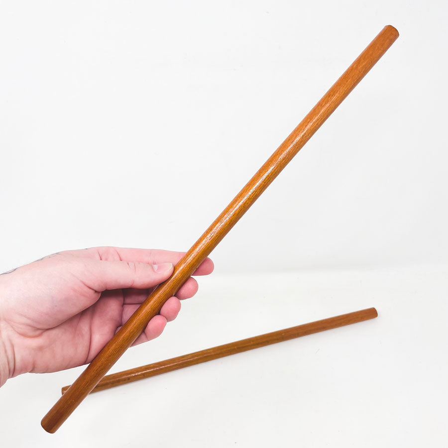 Two Finished Wood Dowels