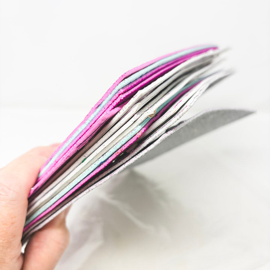Stack of Glitter Foam Adhesive Die Cut Shapes
