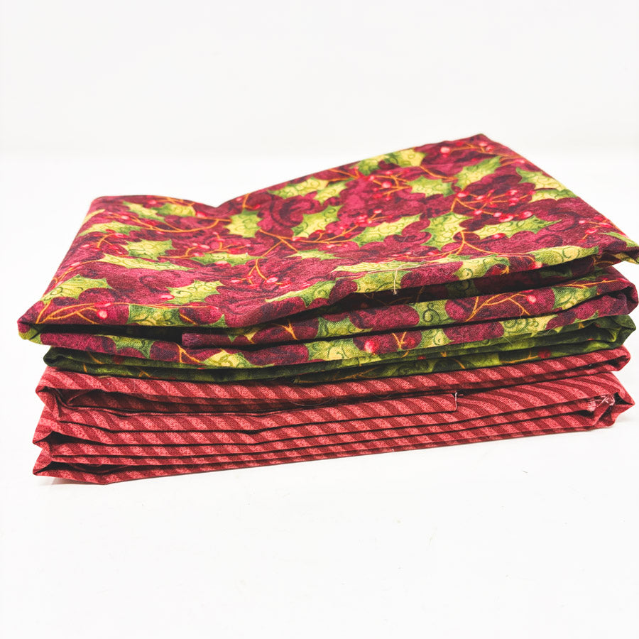 Stack of Festive Holiday Fabrics