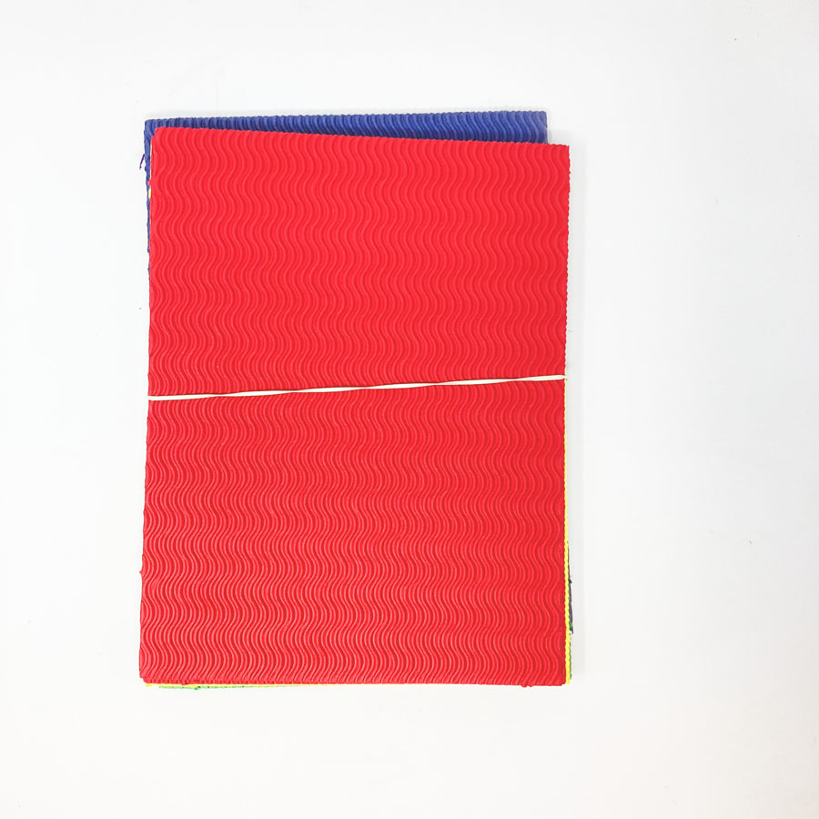 Stack of Wavy Corrugated Bright Paper