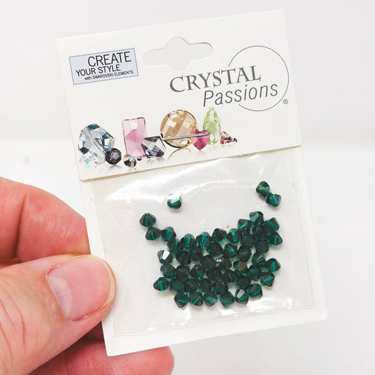 Emerald Crystal Passions Bicone 4mm Beads by Fire Mtn Gems