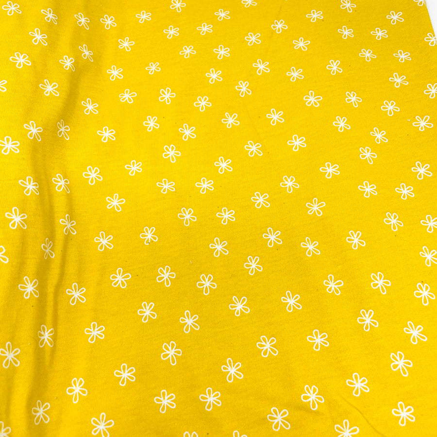 1 yd x 54" White Flowers on Yellow Jersey/Stretch T-Shirt Fabric