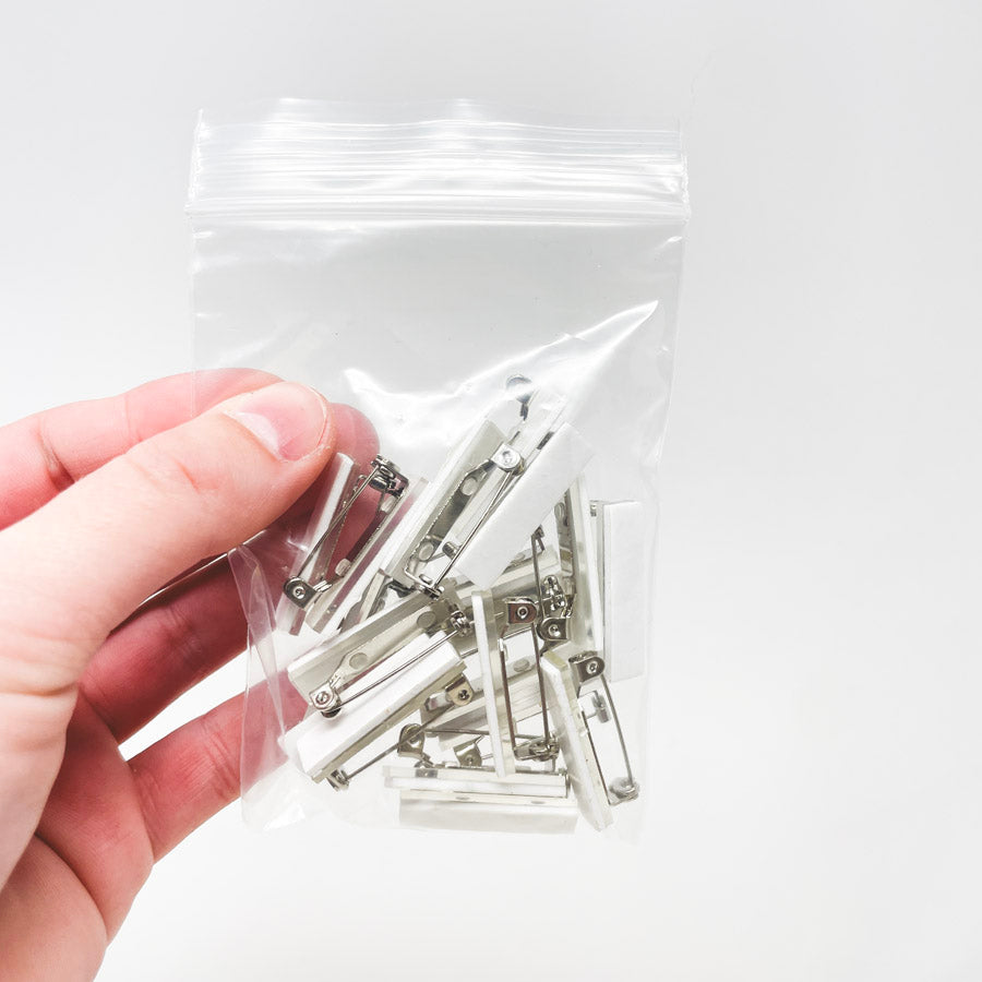 Adhesive Back Bar Pins (White Tape)