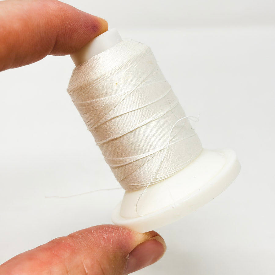 White Cotton Quilting Thread Spindle