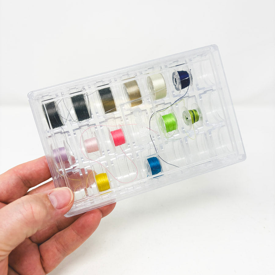 Plastic Bobbins in Case