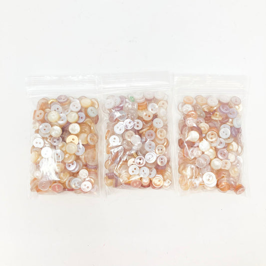 Medium Bag of Coppery Pearl Mix Buttons (1)
