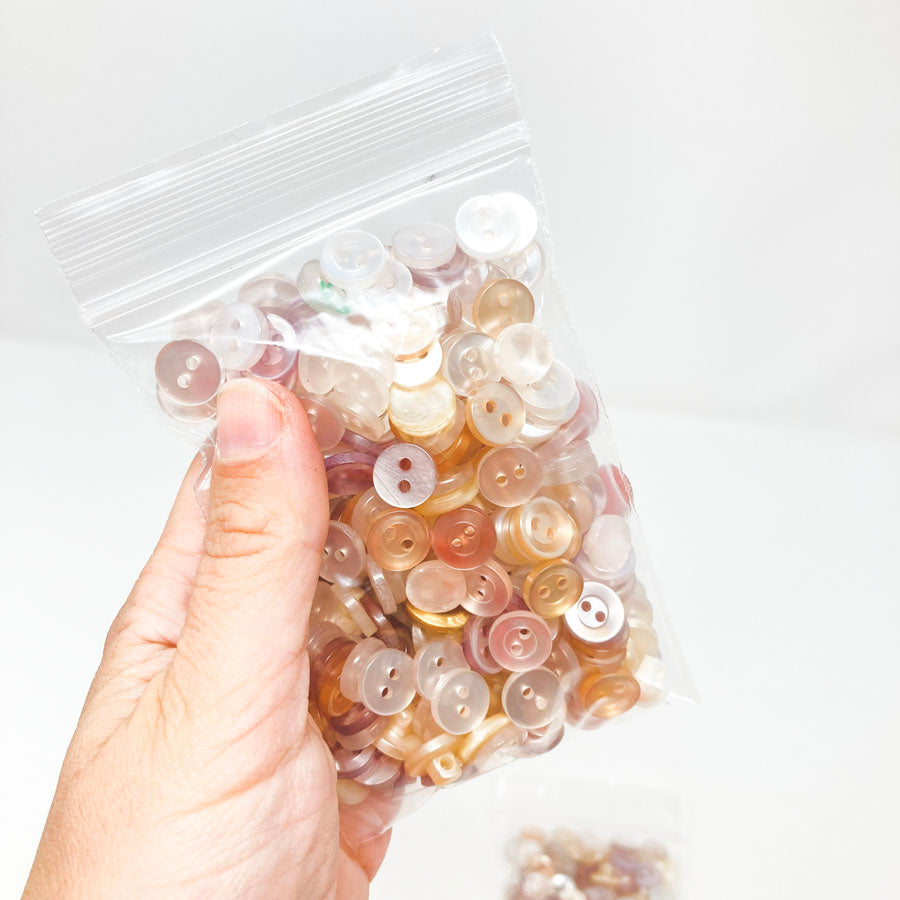 Medium Bag of Coppery Pearl Mix Buttons (1)