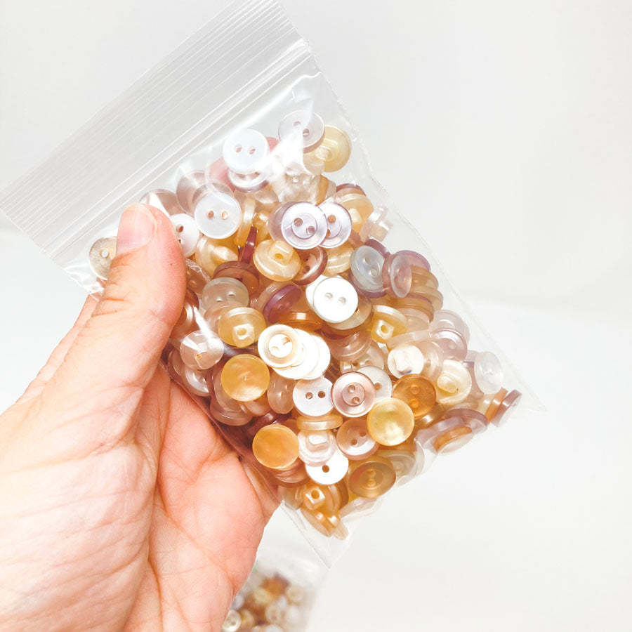 Medium Bag of Coppery Pearl Mix Buttons (1)
