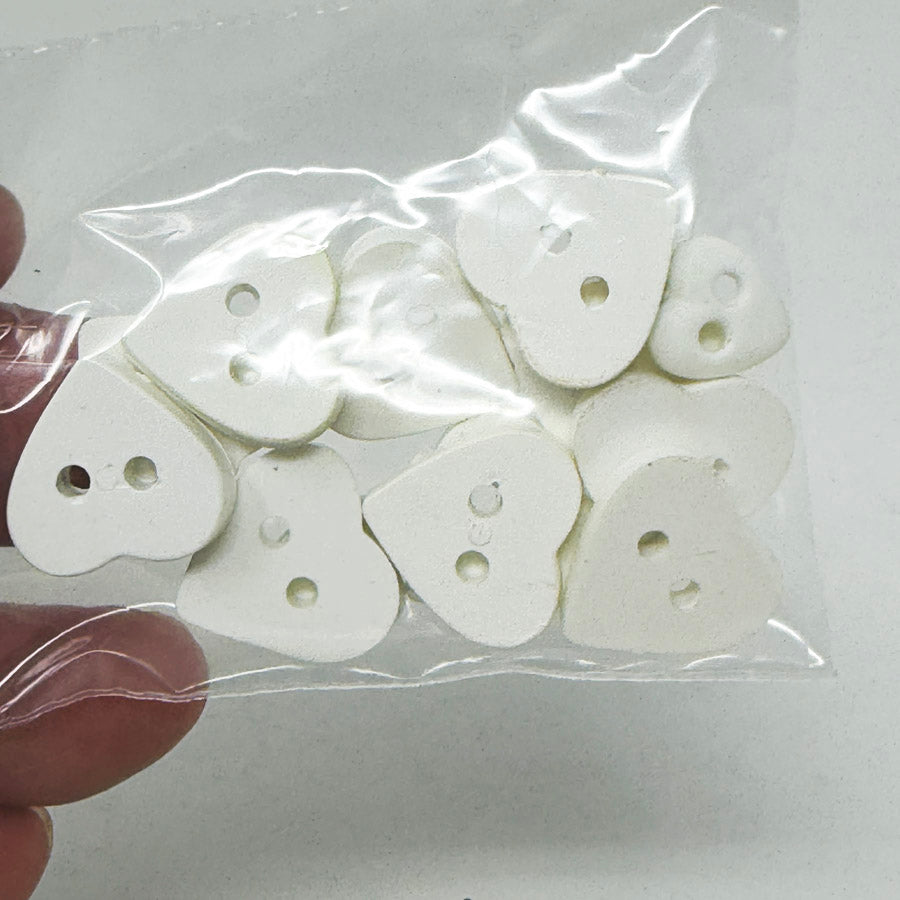 White Plastic Heart Buttons