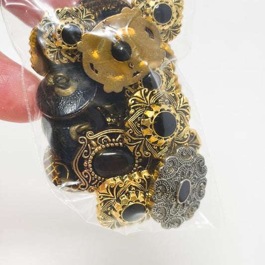 Gold and Black Plastic Shank Buttons