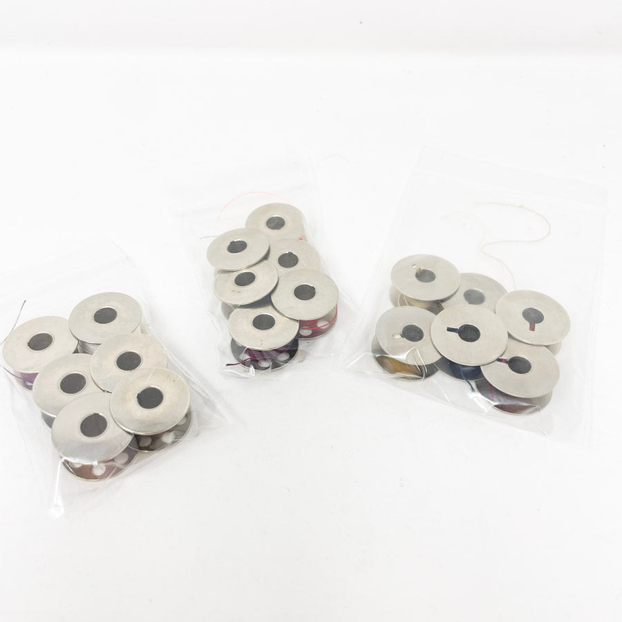 Bundle of Six Metal Bobbins (1)