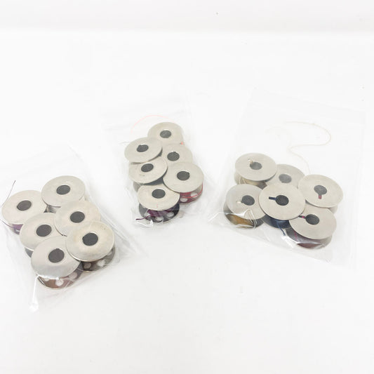 Bundle of Six Metal Bobbins (1)