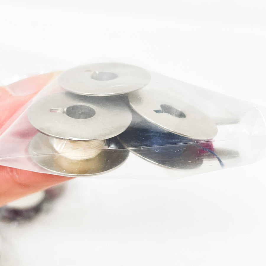 Bundle of Six Metal Bobbins (1)
