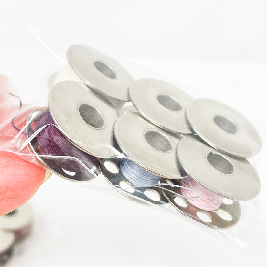 Bundle of Six Metal Bobbins (1)