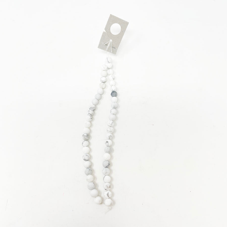 White Marbled Clay Bead Strand