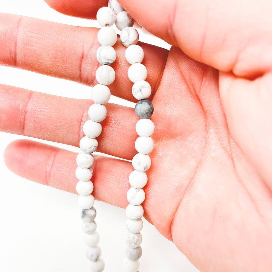 White Marbled Clay Bead Strand