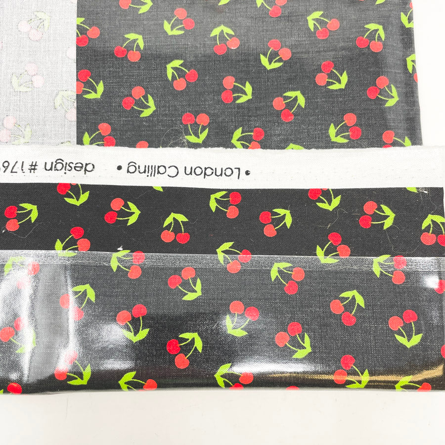 24" x 28" Cherries London Calling Design 17691 Laminated Fabric Remnant