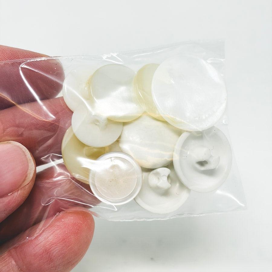 Asst White Plastic Shank Buttons