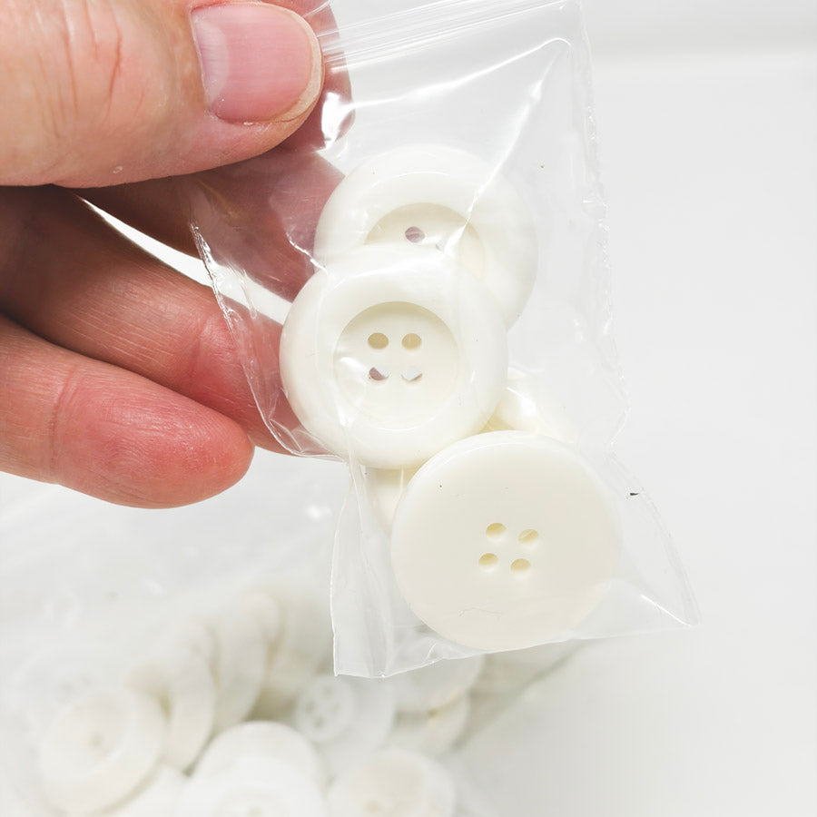 Asst Styles of White Plastic Buttons (1)