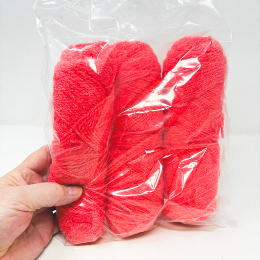 Bundle of Scratchy Bright Coral Yarn