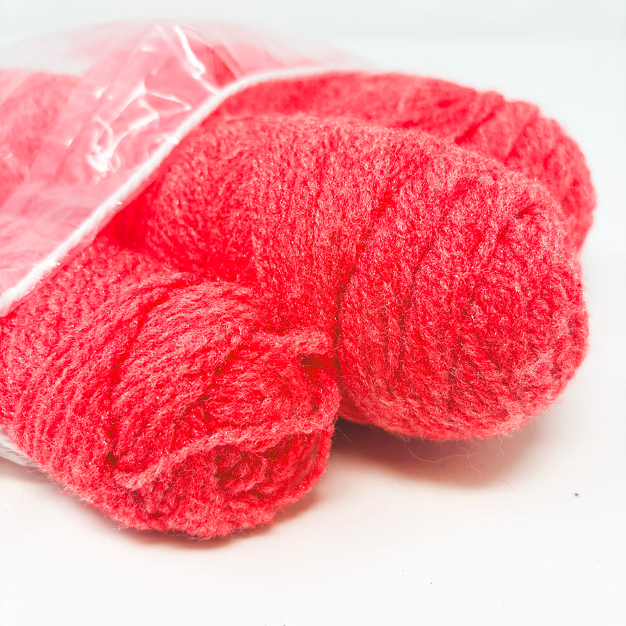 Bundle of Scratchy Bright Coral Yarn