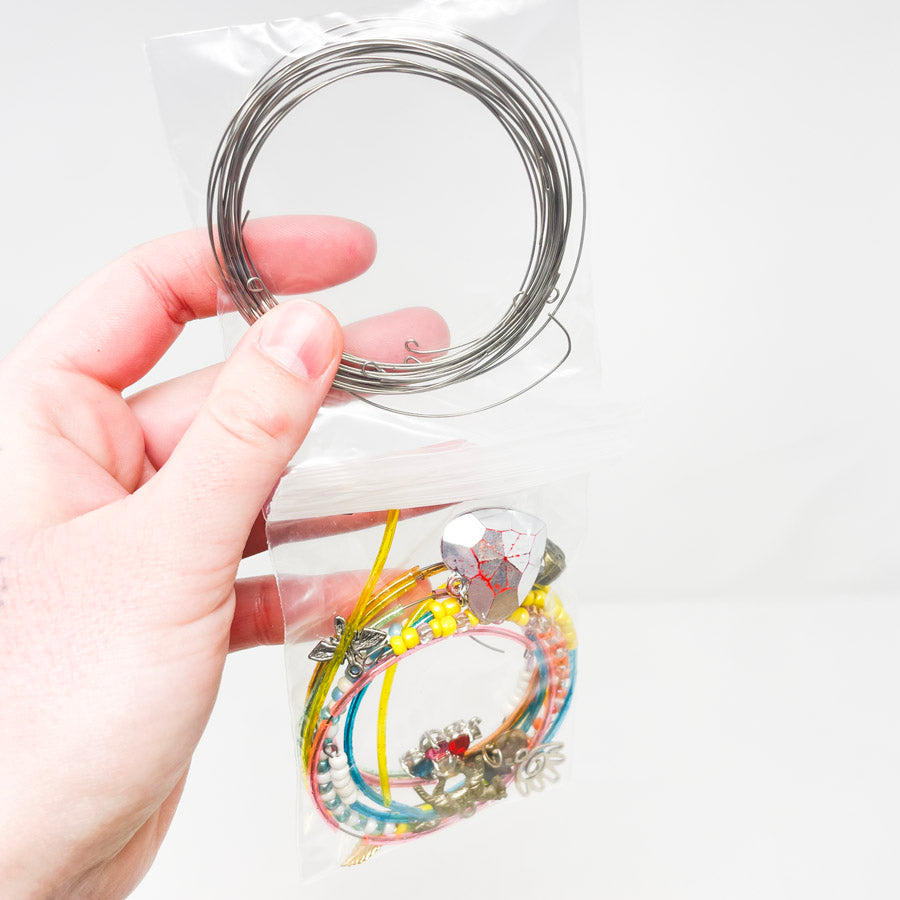 Beaded Bracelets, Charms, and Wire Bundle
