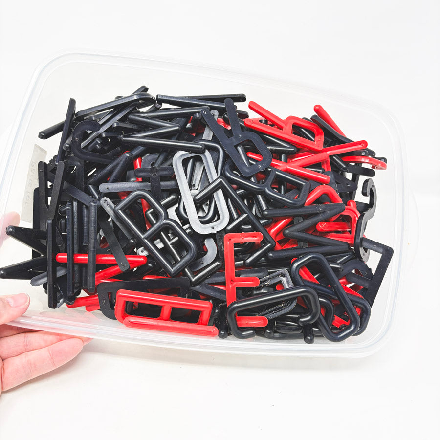Box of Red and Black Felt Board Uppercase Letters