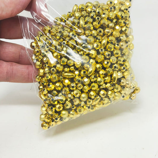 Bag of Gold Plastic Beads