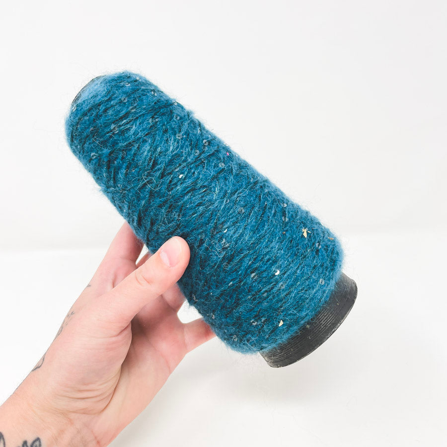 Cone of Turquoise Yarn with Sequins