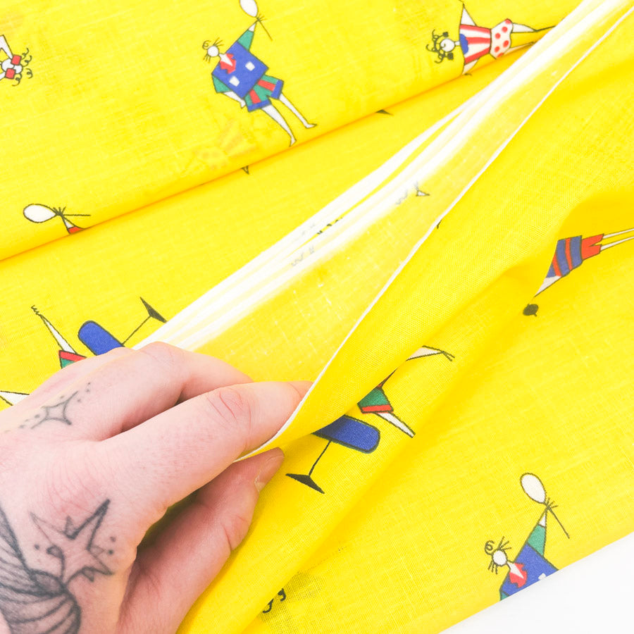 2 Yds x 44" Yellow Playful Figures Cotton Fabric