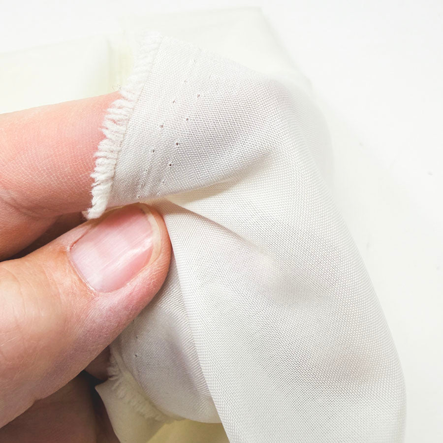 45" x 1 yd. Off-White Poly Blend Fabric