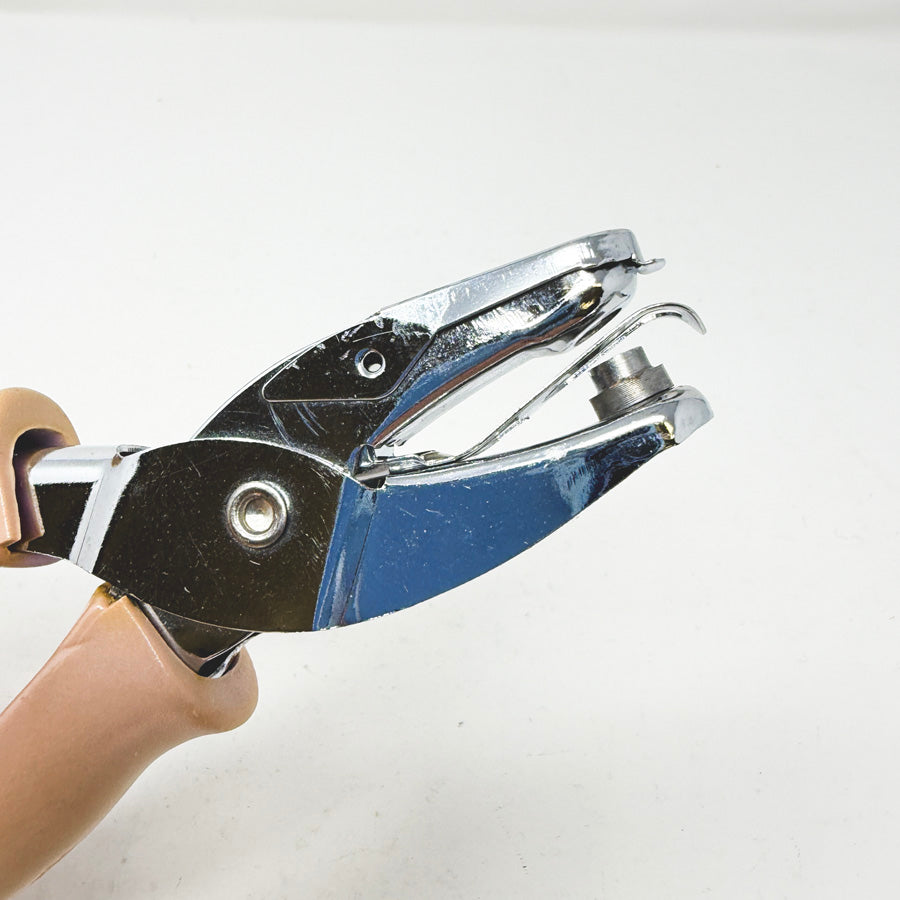 Tan Handle Hole Punch