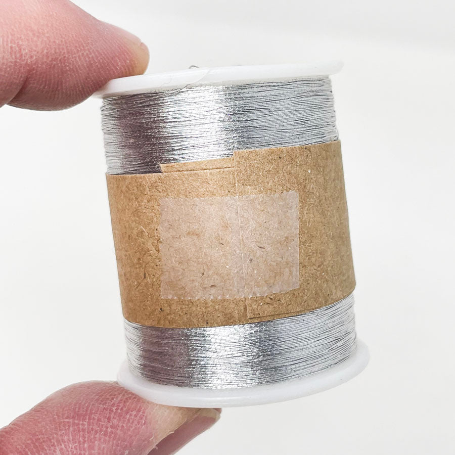 Silver Metallic Thread Spool