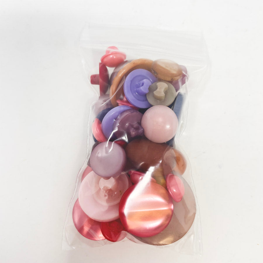 Small Bag of Pink and Purple Shank Buttons
